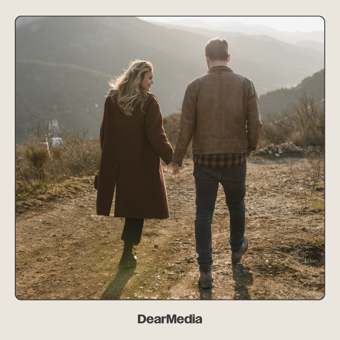 A Couple Strolling in a Hill
