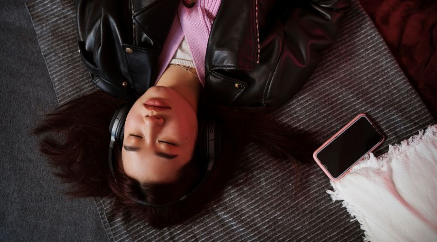 10 Podcasts To Fall Asleep To: Your New Nighttime Ritual