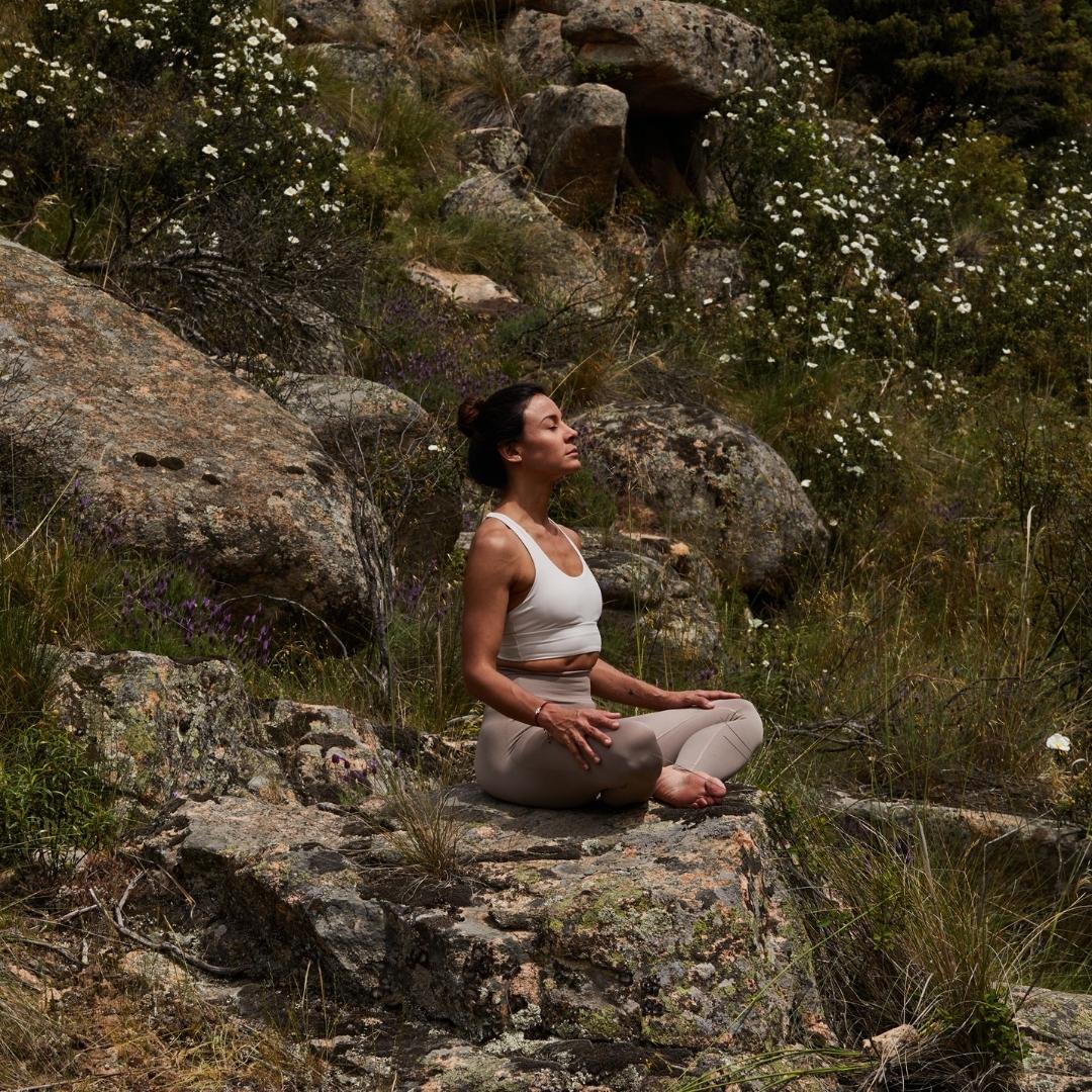 woman meditating in nature